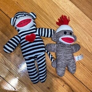 2 Sock Monkey stuffies some signs of pilling and use add to a bundle.